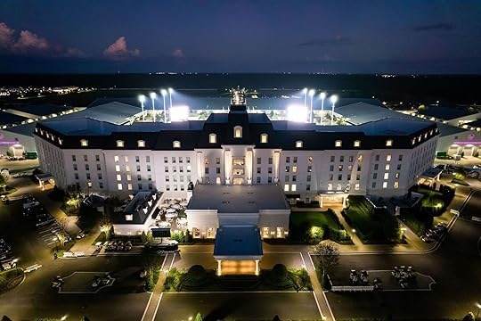 the equestrian hotel from the outside at night