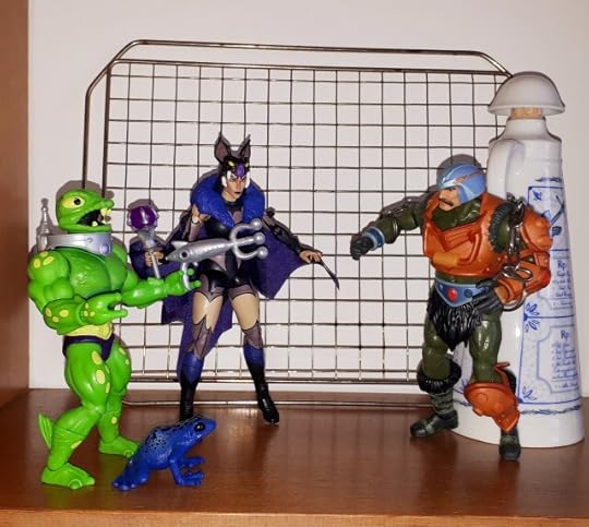 Frog Monger and Evil-Lyn pay a visit to the chained up Duncan.
