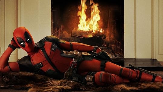Deadpool lounging in front of the fireplace.