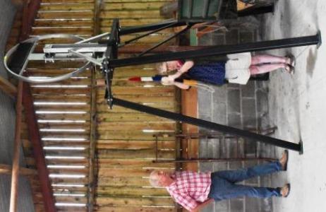 Debbie learning to ring bells on the dumb bell