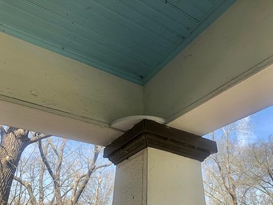 A picture of one of our bird balconies installed atop a pillar under our porch