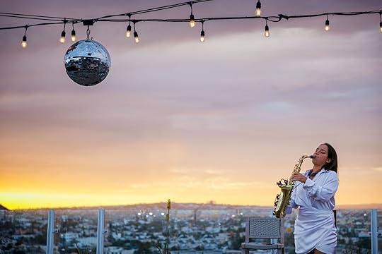 saxophone player on rooftop at corazon resort cabo san lucas