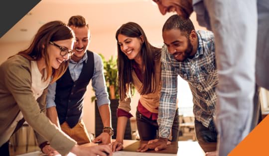 5 employees in a circle around a meeting table operating with a focus on team resilience