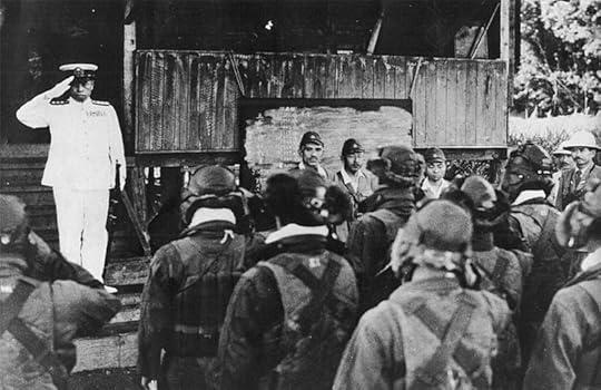 Adm. Isoroku Yamamoto, saluting Japanese naval pilots at Rabaul, hours before his death, Apr. 18 1943 (public domain via Wikipedia)