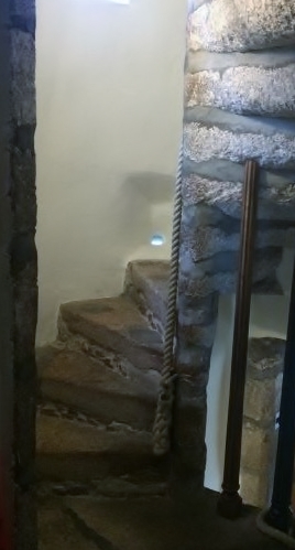 the secret stairway in a castle - Ailish Sinclair, author