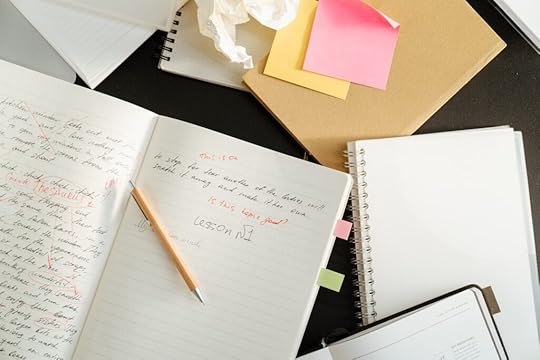Correction marks on a person's writing.