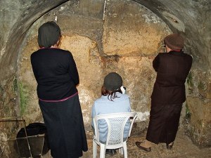 Layers of time: Praying at the closest spot on the Western Wall to the Holy of Holies location.