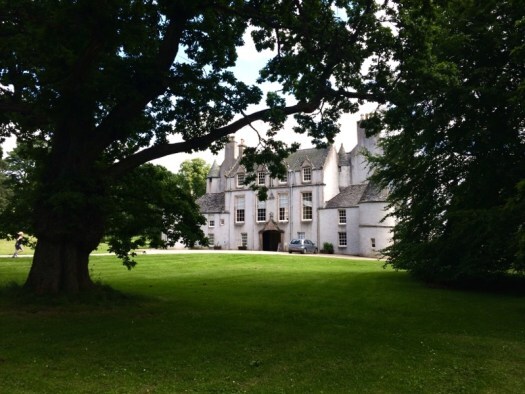 Leith Hall through the trees. Dule Tree post.