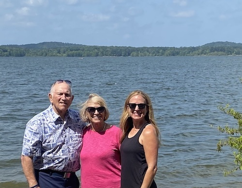 people by lake