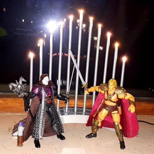 Movie Skeletor and He-Man fight.
