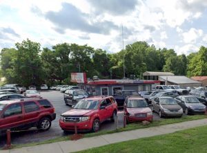 Today the pizza place has been converted into a used car lot.