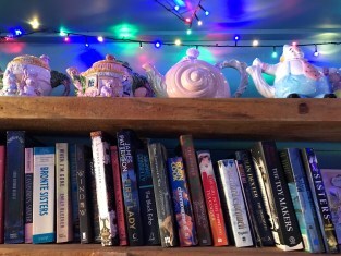Books and teapots at Tea At Elevenses in Cessnock, NSW, where owner Sarah Noble supports independent creatives.