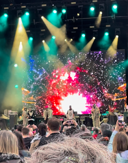 A kaleidoscope of colour as the backdrop of the stage, as Kalush Orchestra - Ukraine's band of seven men - stand in line as they sing their winning song, Stefania.