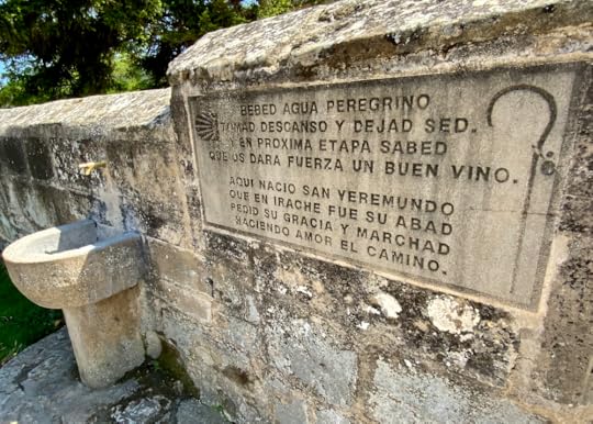 Water fountain and plaque in Villatuerta, hinting at wine fountain in Irache, Navarra, Spain) on the Camino de Santiago