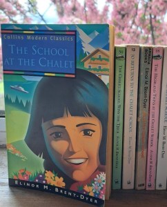 cover of first Chalet School book and spines of several more