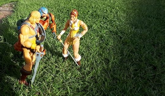 He-Man, Duncan and Teela look out across the plains of Eternia.
