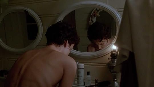Sigourney Weaver at a mirror in