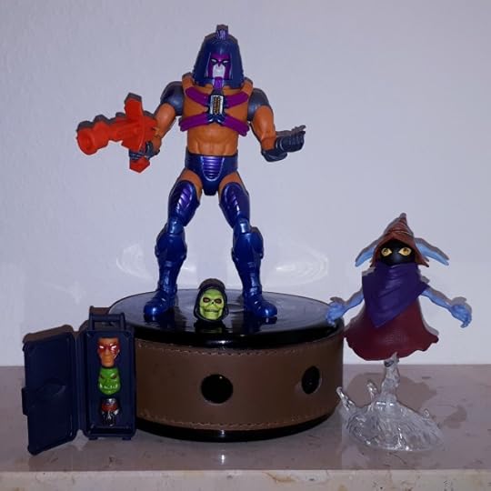 Man-e-Faces in his human face is on stage with Orko announcing him.