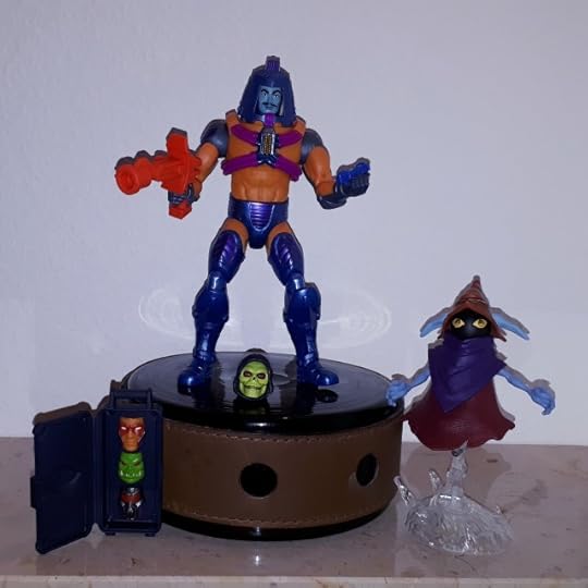Man-e-Faces is on stage with his Keldor face, while Orko looks on.
