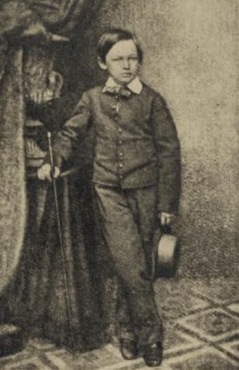 Photo shows Willie Lincoln, full-length portrait, standing, facing slightly right, holding hat in left hand