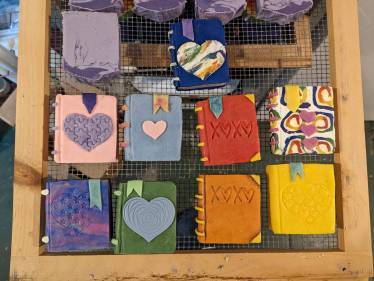 eight bars of soap crafted to look like books, from Holiday Farm