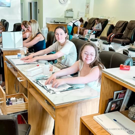 photo of Penny getting her nails done with her friend