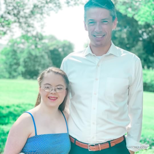 Penny and Peter stand outside and smile for the camera; Penny is ready for prom