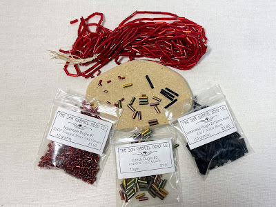 A variety of bugle bead sizes and brands