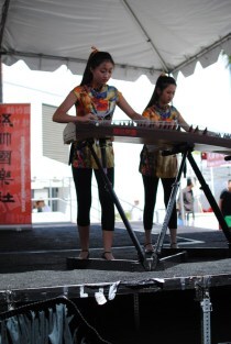 Jen playing a Chinese zither