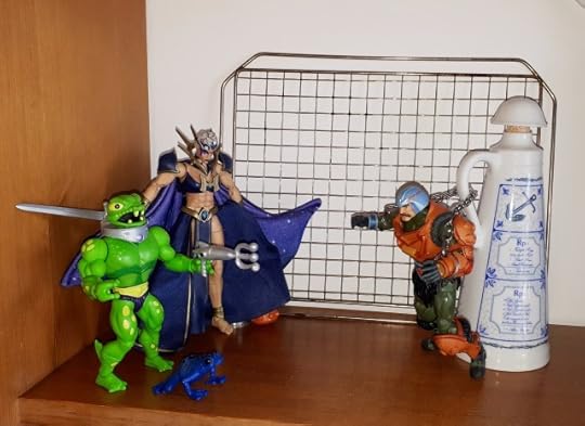 Frog-Monger and Dark-Lyn visit the chained up Duncan in the dungeon of Castle Grayskull.