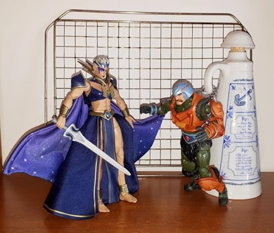 Dark-Lyn faces the chained up Duncan