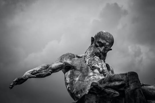 Grayscale Photo of Gray Man Statue by Francesco Ungaro