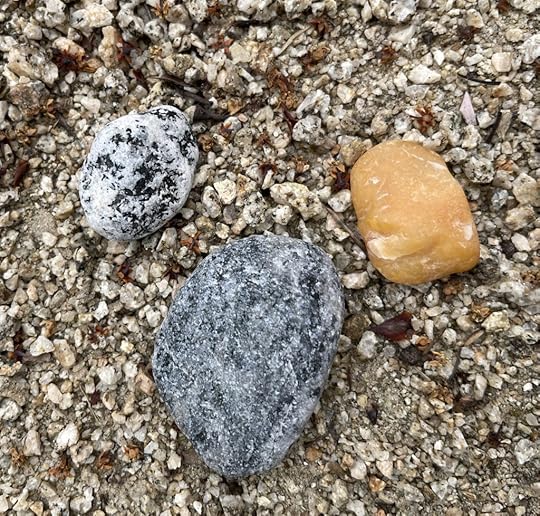 Three stones signify a beach's blessing
