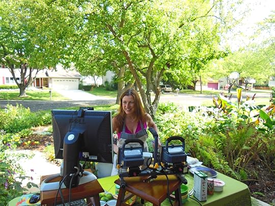 Shawna Coronado filming Google+ Hangouts at her front lawn veggie garden.