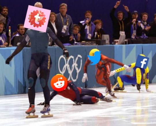 An image of a famous olympic ski race in which a contestant wins due to all the competitors falling over. Superimposed over the winner's face is the Tumblr logo, followed by Reddit, Twitter and Facebook who are clumsily falling over in the far distance.