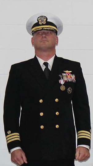 Navy officer in dress blue uniform