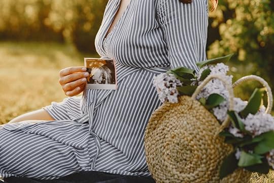 Woman holding Sonogram