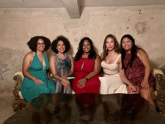A group of women sitting together Description automatically generated with medium confidence