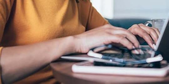 virtual seller typing on a computer
