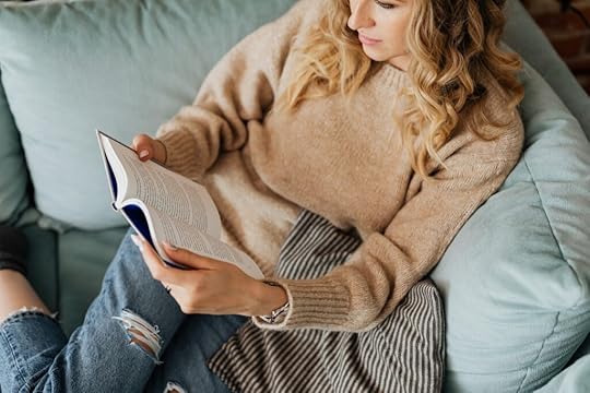 A woman reading a book.