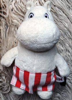 cover of Moominsummer Madness by Tove Jansson with Moominmamma cuddly toy