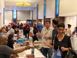 Dayton Ward (standing at right, with yellow lanyard) at Meet the Pros Book Fair.