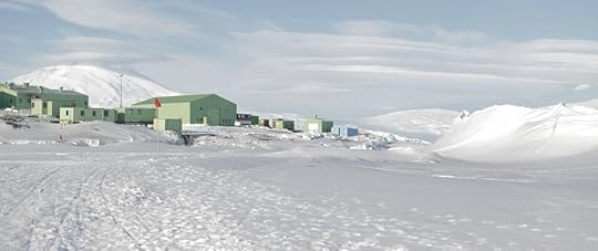 A view of New Zealand's Scott Base from the sea ice, with a pressure wave on the right and Mt Erebus in the distance.