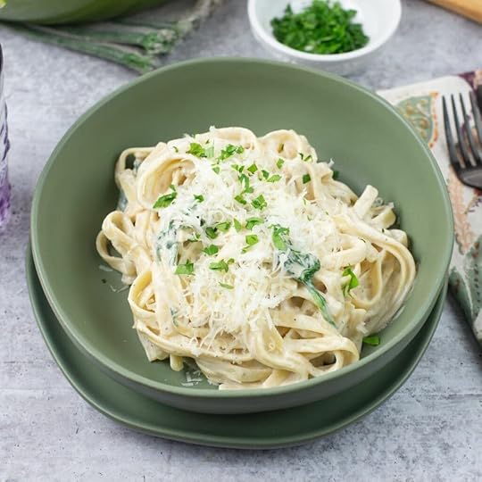 Creamy Alfredo Sauce with Cream Cheese in a green bowl.