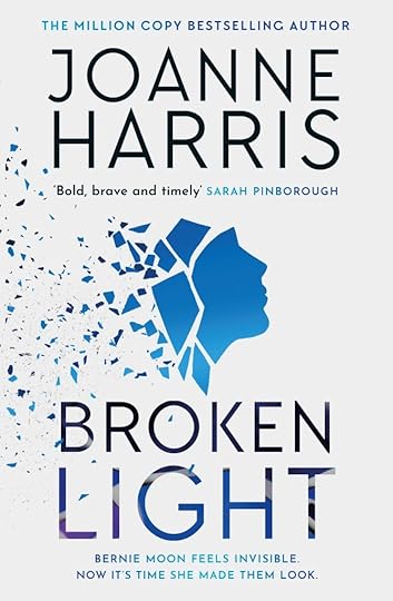Cover shows a woman's silhouette in blue glass that is shattering.