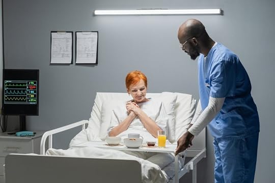 Nurse bringing breakfast for patient