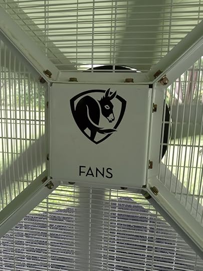 large white fan with logo of an ass's rear end