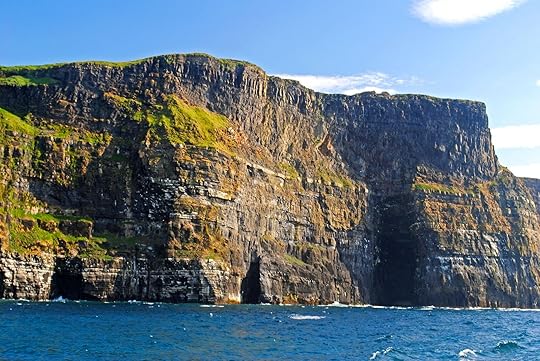 The Cliffs of Moher from a boat tour. The Harry Potter cave featured in
