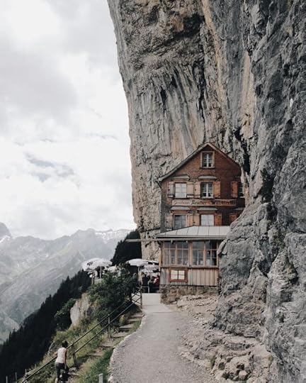 Brown Wooden House on Edge of Cliff by Martin P��chy