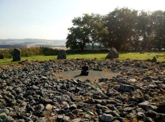Ailish Sinclair in a stone circle